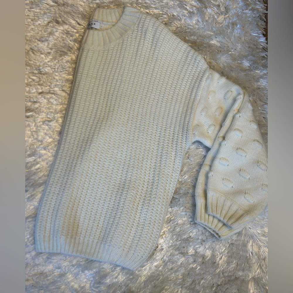 Nice ivory Gilli sweater.  Worn twice.  Looks really cute with jeans!